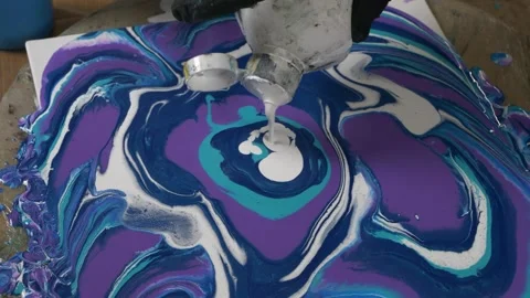 Close up. paint flowing on canvas. diy art and creation. slow motion shot. .. Stock Footage 238937406