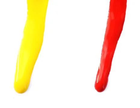 Close up of paint leaking on white background Stock Photos