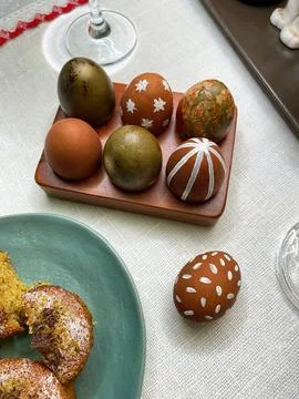 Close-up of painted dark red eggs with polka dots and stripes Stock Photos
