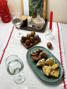 Close-up of painted dark red eggs with white stripe, green eggs Stock Photos