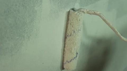 A close-up of painting a wall. Stock Footage 300369665