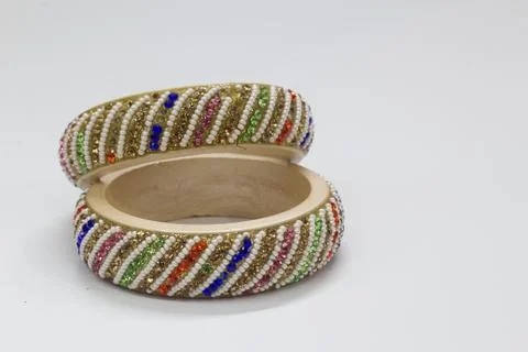 Close up of pair of bangles isolated on white background with space for text Stock Photos
