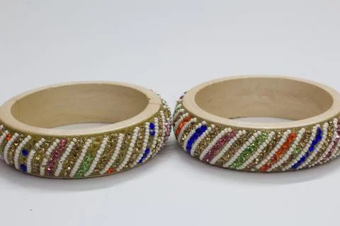 Close up of pair of bangles isolated on white background with space for text Stock Photos