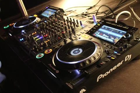 Close up of a pair of CDJs and a mixer Stock Photos