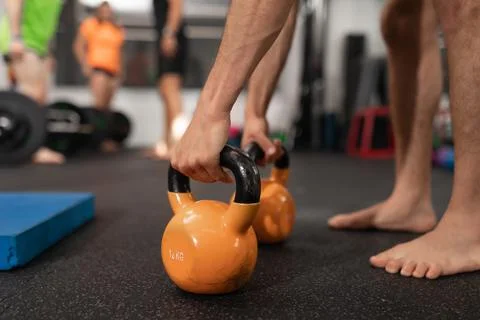 Close up of a pair of kettlebells being held Stock Photos