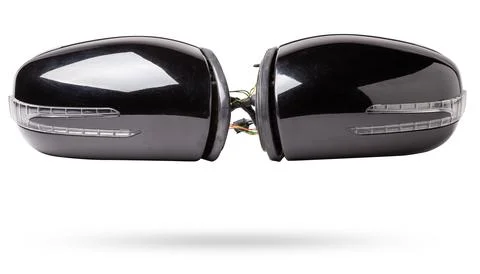 Close-up on a pair of side mirrors from a minibus with turn signal repeater.. Stock Illustration