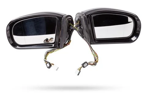 Close-up on a pair of side mirrors from a minibus with turn signal repeater.. Stock Illustration