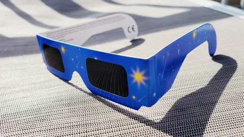 Close Up of a Pair of Solar Eclipse Glasses Stock Footage 273665866