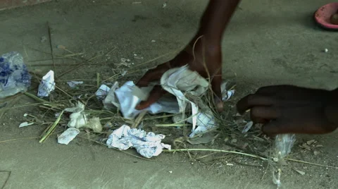 CLOSE UP: PAKRO STUDENT PICKS UP TRASH Stock Footage 58106247