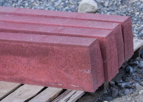 Close-up pallets with folded lies on the ground red Stock Photos