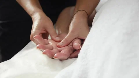 Close-up palm massage during professional therapy 스톡 동영상 344048168