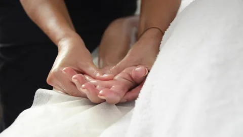 Close-up palm massage during professional therapy Stock Footage 344048173