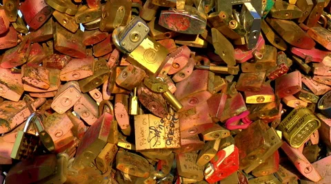Close up pan across love padlocks under sunset rays in Paris, France Stock Footage 46851145
