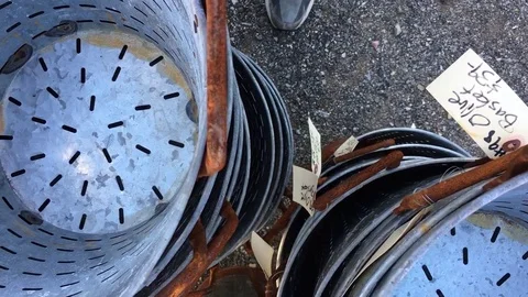 Close-up pan across tops of nested olive baskets. Stock Footage 72610638