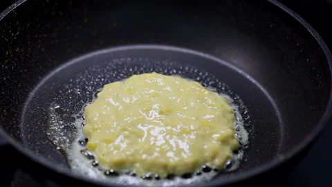 Close-Up Of Pan Cake Being Cooked On Pan Stock Footage 160117795