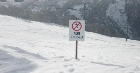 Close Up Pan of Closed Sign on Ski Run Winter Covid 19 Shutdown Stock Footage 137840386
