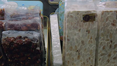 Close up pan of dark and white Spanish Turrons, Valencia, Spain Stock Footage 297271065