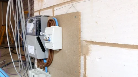 Close up pan of electrical cables on floor Stock Footage 112614994