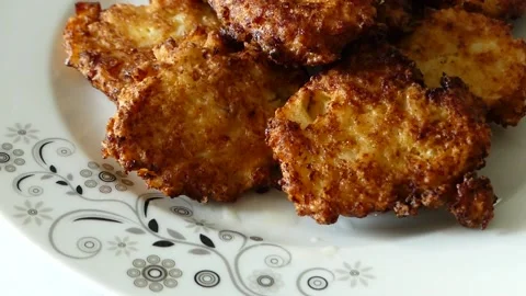 Close-up pan fried cauliflower,fried cauliflower patties in plate, Stock Footage 167136604