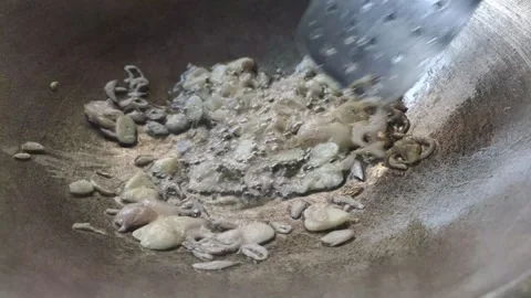 Close-up of Pan-frying Shallots and Garlic Stock Footage 319295145