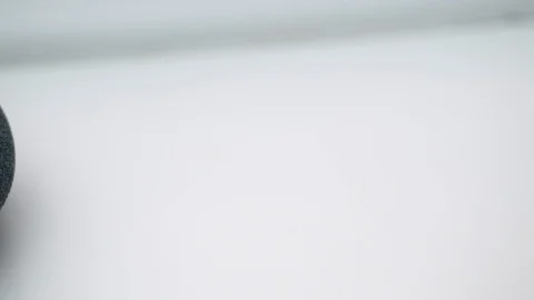 Close up Pan Of Home Mini Smart Speaker Video stock 104117161