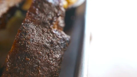 Close up pan left of ribs  動画素材 112575814