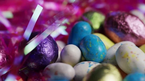 Close up pan of mixed Easter eggs in grass Stock Footage 327910327