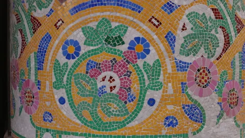 Close up pan of mosaic flower on the facade of the palace of catalan music Stock Footage 249245655