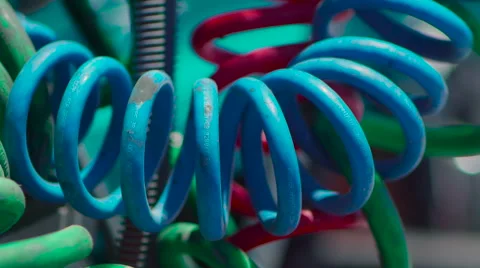 Close up pan of multi colored cable connectors between freight liner trucks 스톡 동영상 60031716