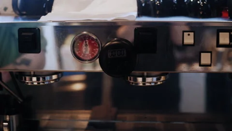 Close-Up Pan Right on Coffee Machine Control Panel with Barista at Work 库存影片 307583007