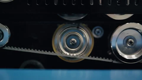 Close-Up Pan Right of Rotating Production Machine Components 库存影片 307590254