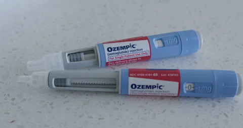 Close Up Pan Right of Two Ozempic Pens