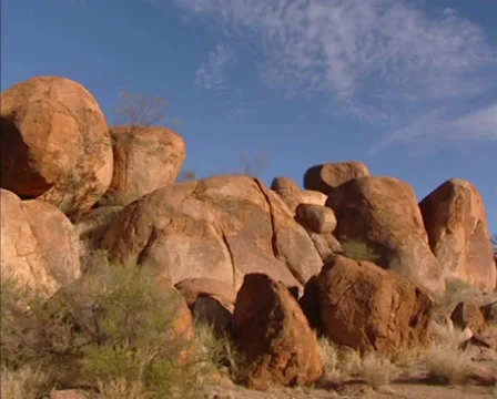 Close up + pan rock formations at the Devils Marbles Karlu Karlu Stock Footage 31957088