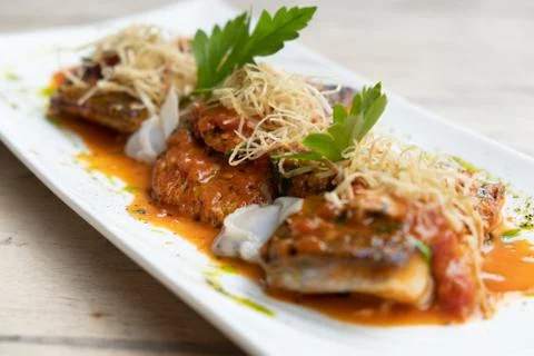 Close up of pan seared sea baas snapper fish mediterranean style Stock Photos