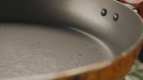Close-up on the pan throw fresh beef steak. Slow Motion HD Stock Footage 112088089