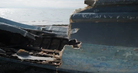 Close up pan video of old broken wooden boat on the shore. Stock Footage 151933082