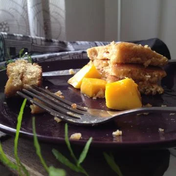 Close up pancake with topped mango Stock Photos