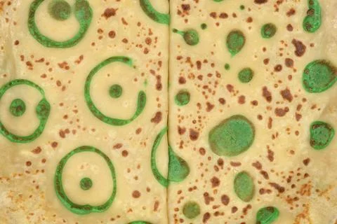 Close up of pancakes with green circle patterns Stock Photos
