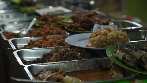 Close-Up Panning A Buffet Of Delicious, Fresh Asian Food In Silver Metal Stock Footage 154563782