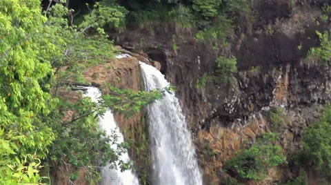 Close up Panning Down to the Bottom of the Rainbow Falls at Kauai, Hawaii Stock Footage 33194301