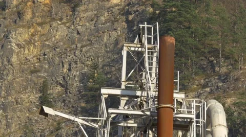 Close panning down old lonley cement factory in front of quarry Stock Footage 57131421
