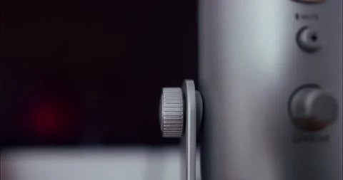 Close-up panning footage of a volume button on a retro microphone Stock-Footage 233728695