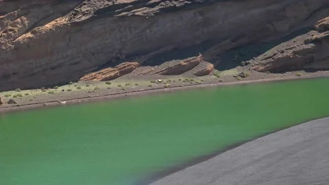 Close-up panning shot of Charco de Los Clicos, Charco Verde, Lanzarote. 4k Stock Footage 154553290