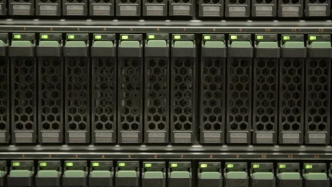 Close-up panning shot of cloud computing system with blinking lights in server Stock Footage 129206125