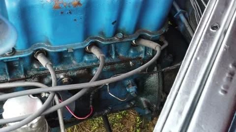 A Close Up Panning Shot of an Inline Six Cylinder Car Engine Stock-Footage 156104749