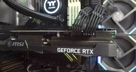 Close up panning shot of powerful GPU inside custom computer build. MSI Stock Footage 152358169