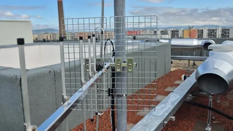 Close Up Panning Shot of Professional Yagi Base Antenna on Rooftop Stock Footage 340562830