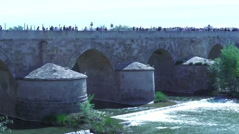 Close Up Panning Shot of Roman Bridge in Cordoba Spain Stock Footage 335989964