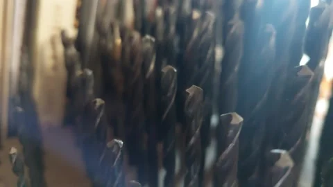 Close-up panning shot of twist drill bits organizer set, workshop tools Vídeo Stock 336508066