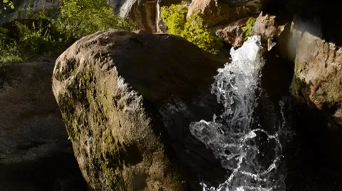 Close up panning waterful inside cave Stock Footage 8623099